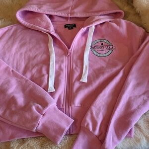Like new Playboy brand full-zip sweatshirt in size Extra Small.